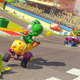 Yoshi throws a banana in Mario Kart 8 Deluxe, which is still putting up staggering sales figures.